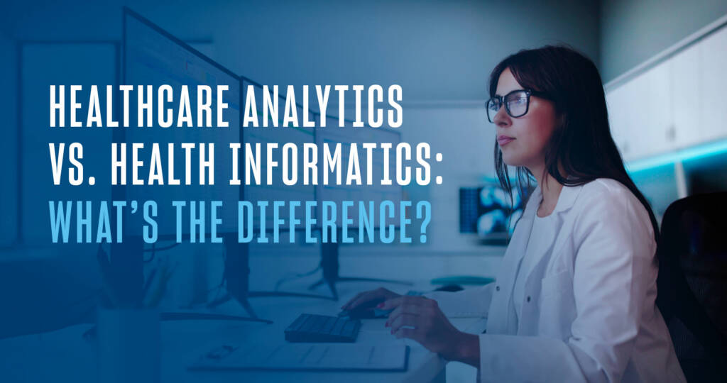 Women in a white doctor's coat looking at a monitor sitting at a desk