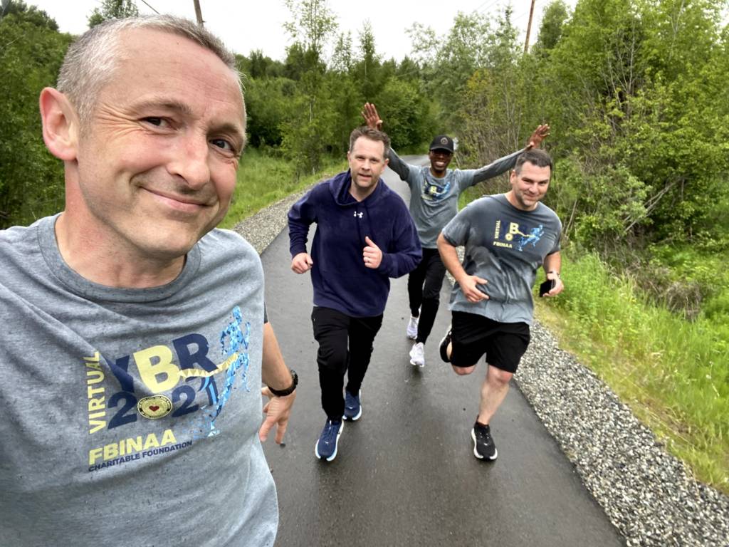 a group of men running together