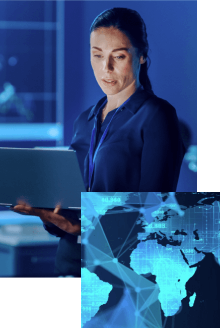 Female cyber security engineer looking at a laptop in a blue room
