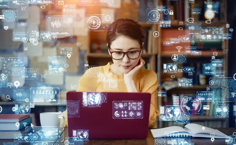 Women at a computer demonstrating artificial intelligence