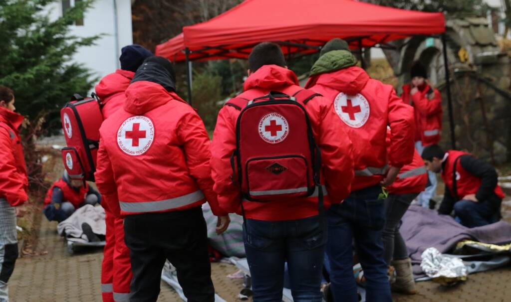 Sofia, Bulgaria - December 5, 2018: Volunteers from the organization of the Bulgarian Red Cross participate in training with a fire service. They help provide first aid to people after an earthquake and fireSofia, Bulgaria - December 5, 2018: Volunteers from the organization of the Bulgarian Red Cross participate in training with a fire service. They help provide first aid to people after an earthquake and fire