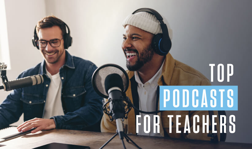 two male podcasters wearing headphones sit in a studio in front of microphones, laughing together.