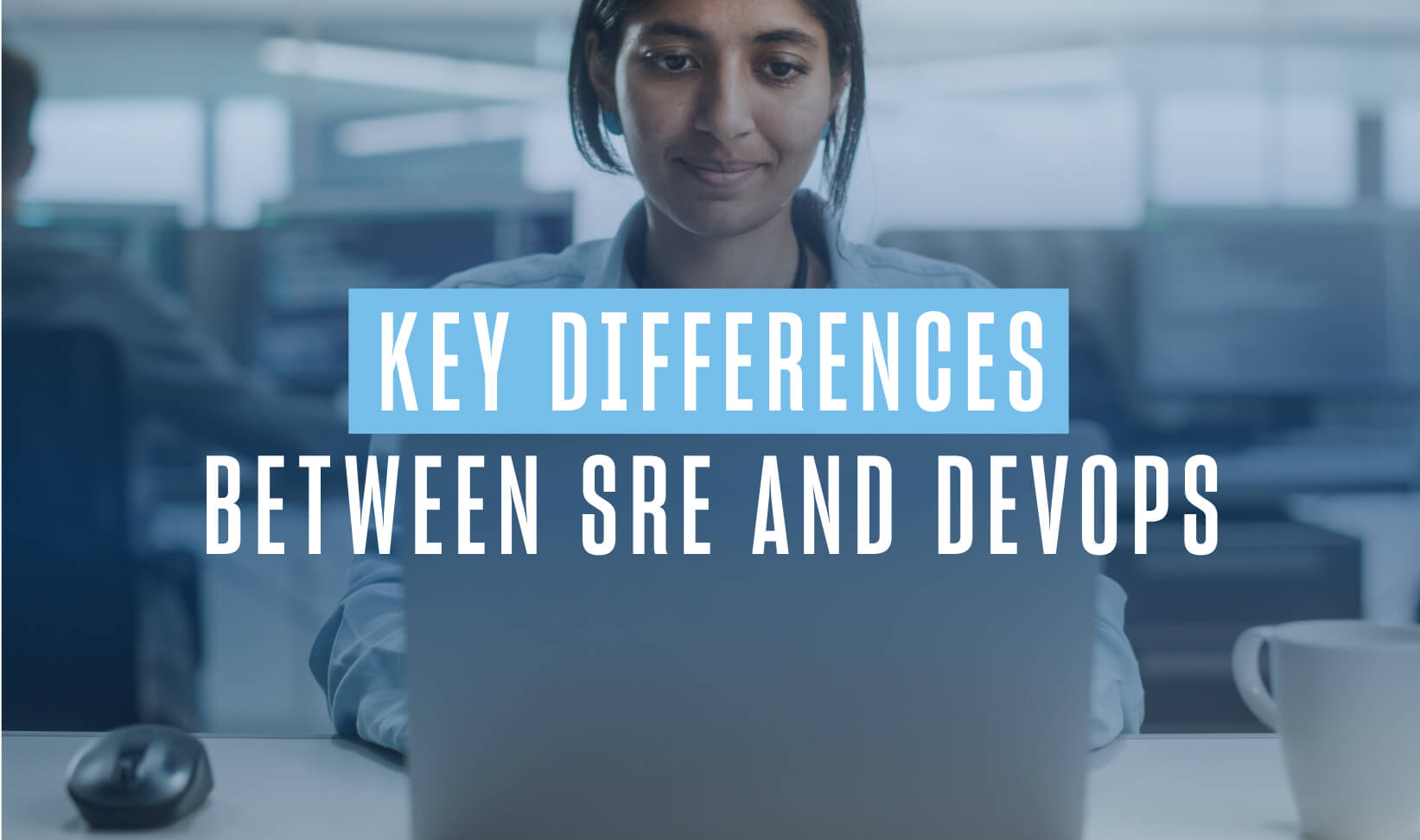 woman with dark hair looks at a laptop screen sitting on a tabletop. overlay text reads key differences between SRE and Devlops