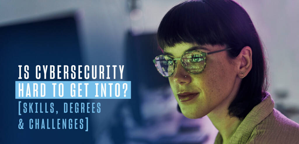 a woman with dark hair and glasses looks at a computer, the copy overlaid over the image says is cybersecurity hard to get into?