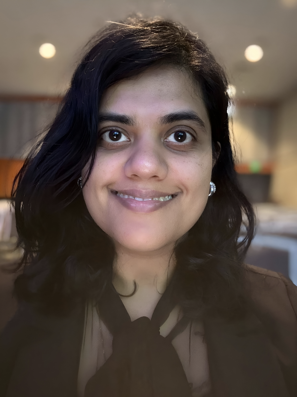 Headshot of Mansi Thakar, MS, PMP