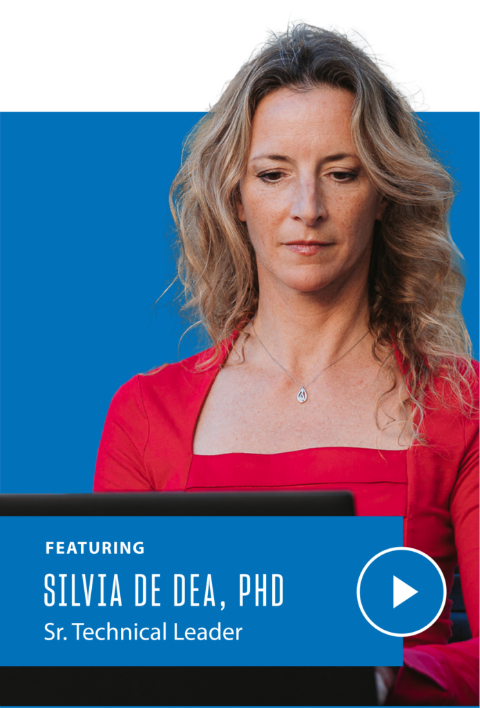 Silvia looking at her computer