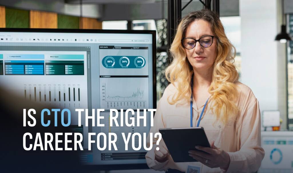 a woman with blonde hair looking at her computer