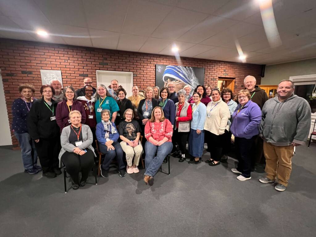 A group of people that went on the retreat taking a picture together